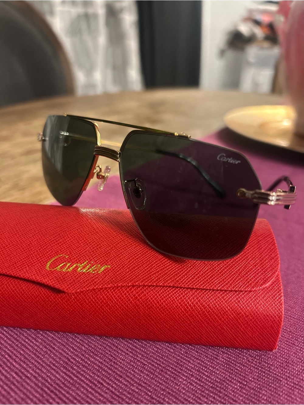 Cartier Gold Rimless Sunglasses with Dark Lenses